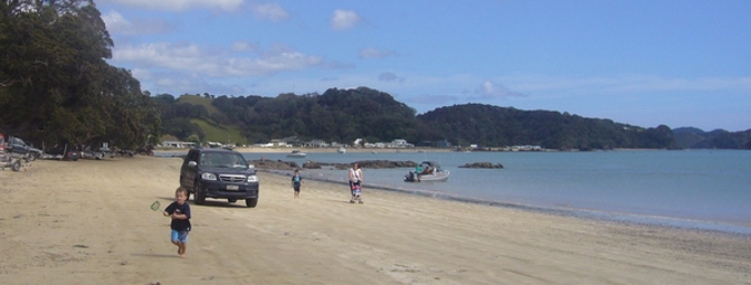 Take care around people when driving on the beach. Take care around people when driving on the beach.