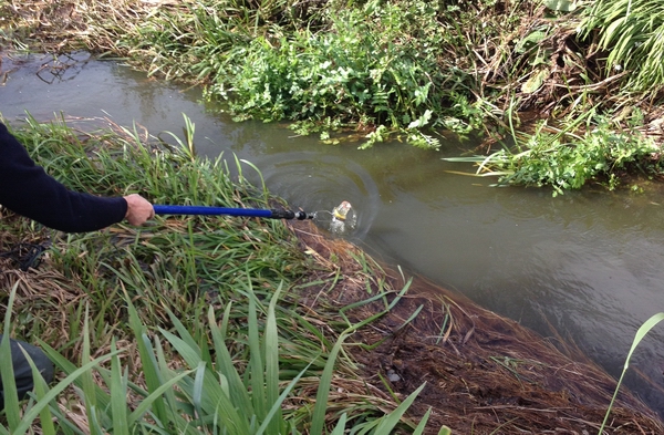 Taking water quality samples. Taking water quality samples.